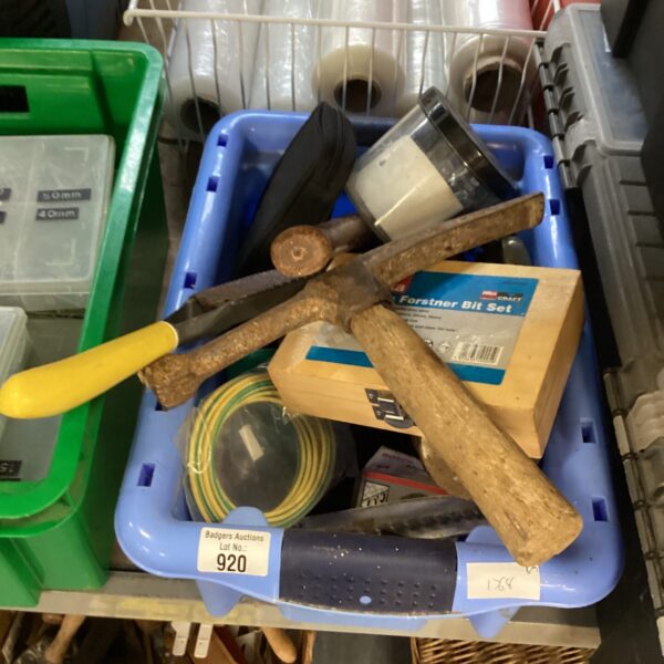 Mixed tool lot with a lead hammer inside a storage box.