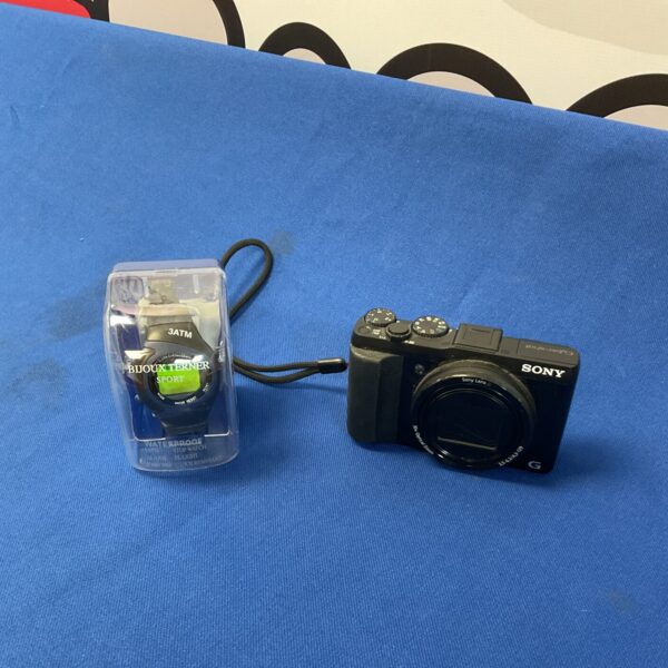 Sony Cyber-Shot digital camera with Bijoux Terner waterproof watch.