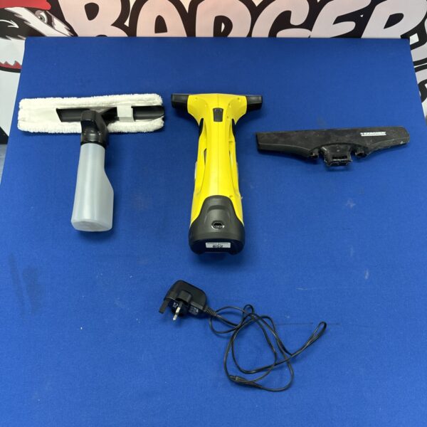 Karcher WV50 window vacuum cleaner with spray bottle and charger.