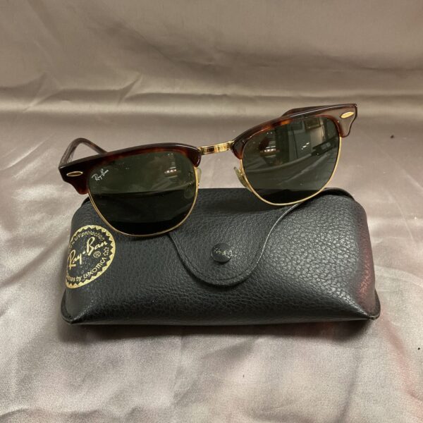 Front view of vintage Ray Ban Clubmaster sunglasses with gold and tortoiseshell frame.