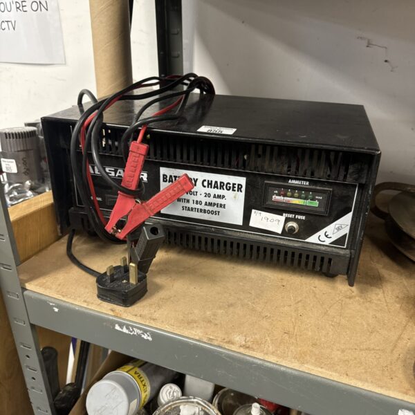Used Absaar car battery charger with cables and dial.
