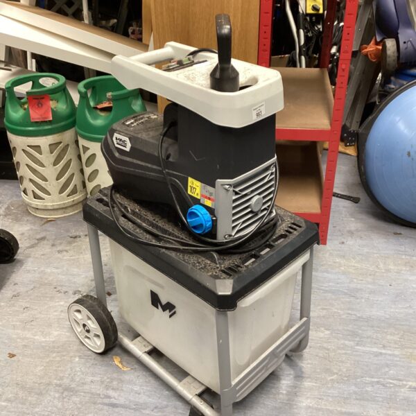 Used Mac Allister garden chipper on wheels for garden waste reduction.