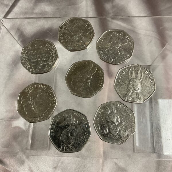 Beatrix Potter 50p coin collection featuring Jemima Puddle-Duck and Squirrel Nutkin.