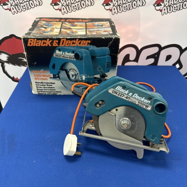Vintage Black and Decker DN227 circular saw, a handheld power tool.
