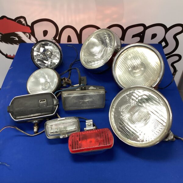 Vintage classic car spotlights in a mixed lot.