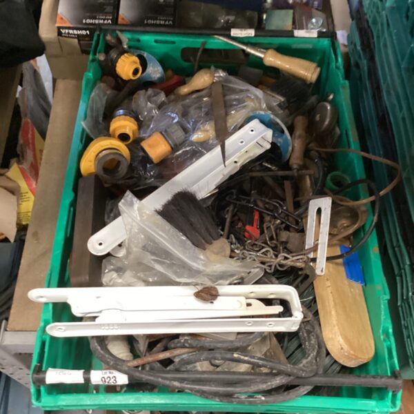 Mixed shed clearance lot with hose connectors and hand tools.