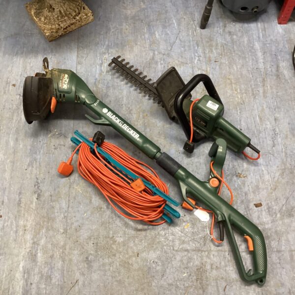 Black & Decker hedge trimmer and strimmer combo for garden maintenance.