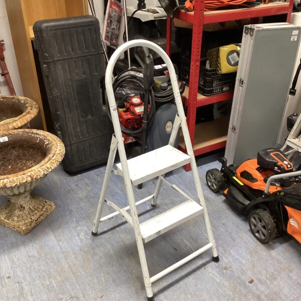 Silver aluminium folding step ladder with two steps.