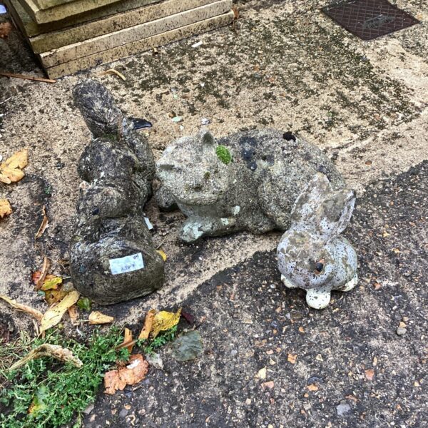 Lot of three weathered stone garden ornaments.