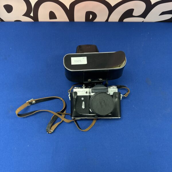 Vintage Zenit 12XD camera with leather case, classic Soviet photography.
