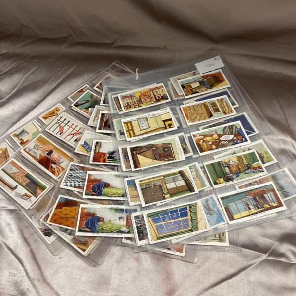 Vintage A R P cigarette cards in protective sleeves, collectible British ephemera.