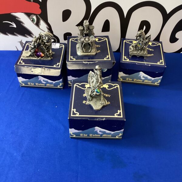 Boxed set of four Myths and Magic collectible figures.