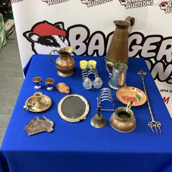 Vintage mixed metalware lot featuring a copper jug and brass items.