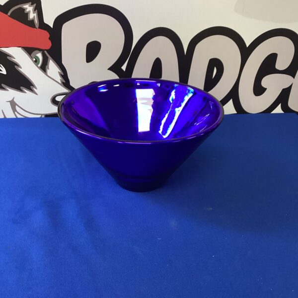 Vintage blue glass bowl with a striking mid-century modern design.