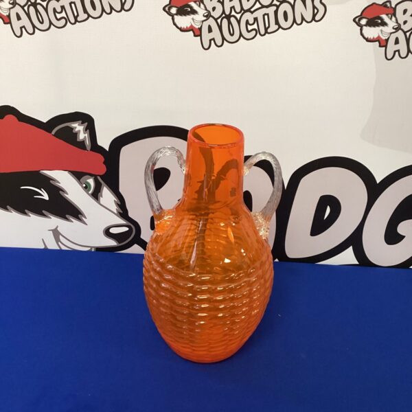 Vibrant orange 1950s Murano glass vase with textured beehive design.