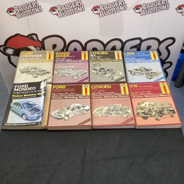 A lot of eight vintage Haynes car repair manuals.