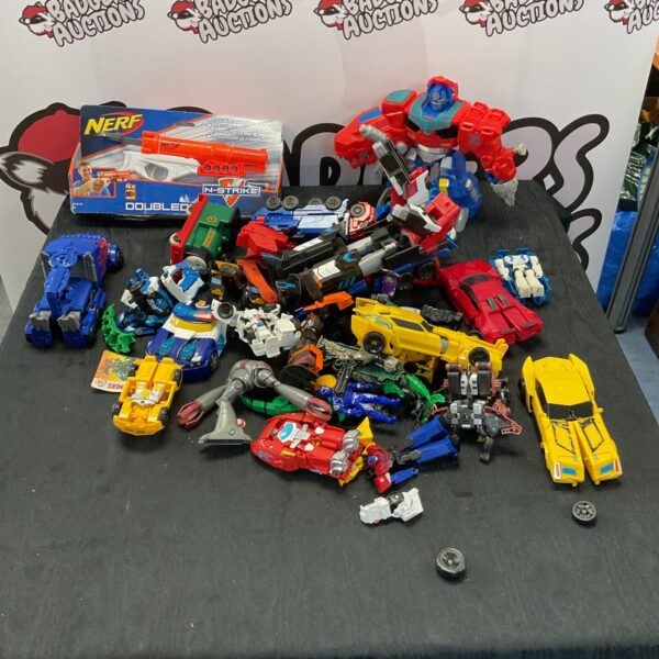 Vintage Transformers and new Nerf gun toy lot for collectors.