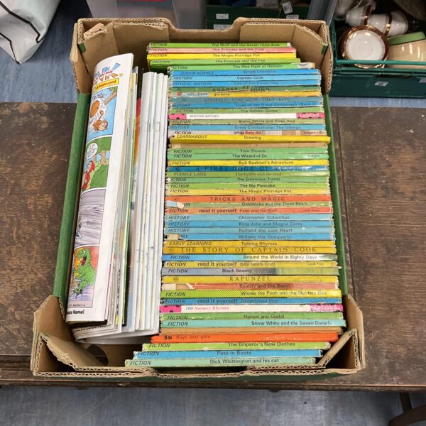 Vintage children's book collection with colourful illustrations.