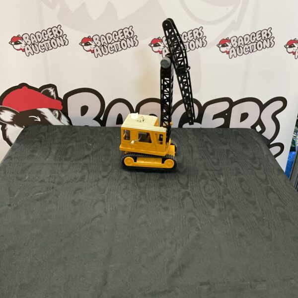 Vintage Banda toy crane, a classic construction toy.