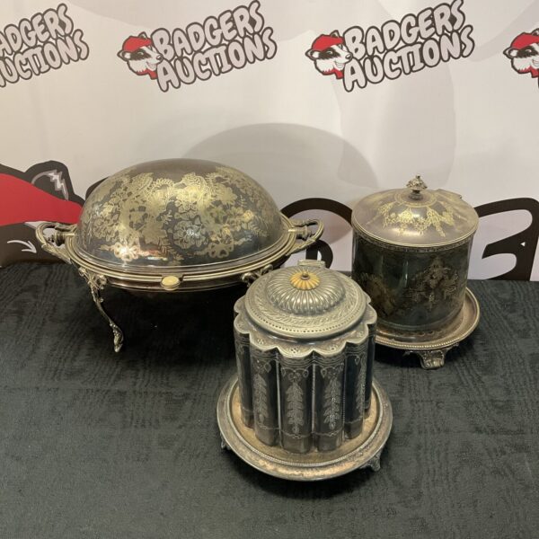 Antique silver plate tea caddy, biscuit barrel, and turnover dish set.