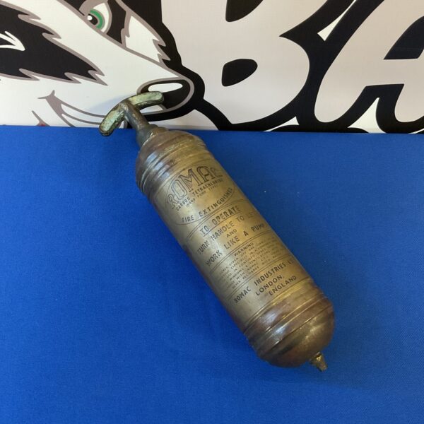 Vintage Romac fire extinguisher in red and brass.