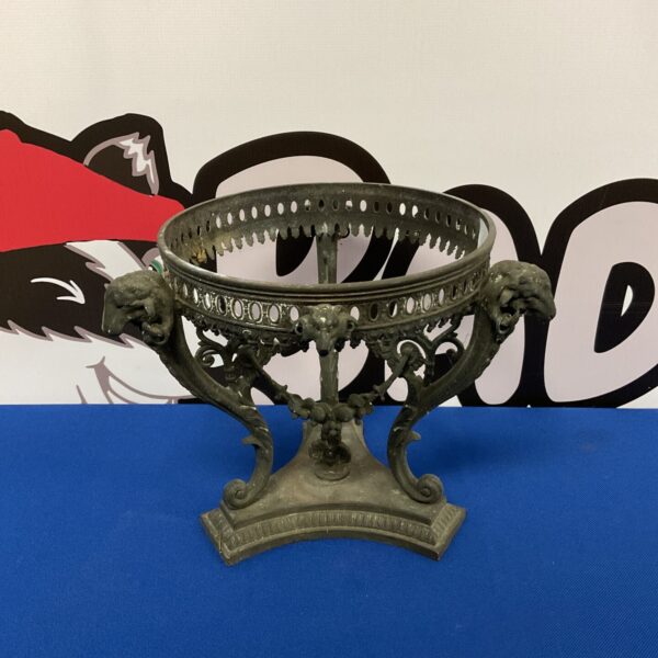 Antique bronze pedestal bowl with rams head sculpture.