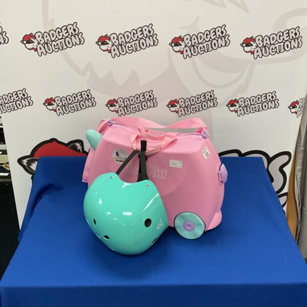 Pink Trunki ride-on suitcase with matching crash helmet.