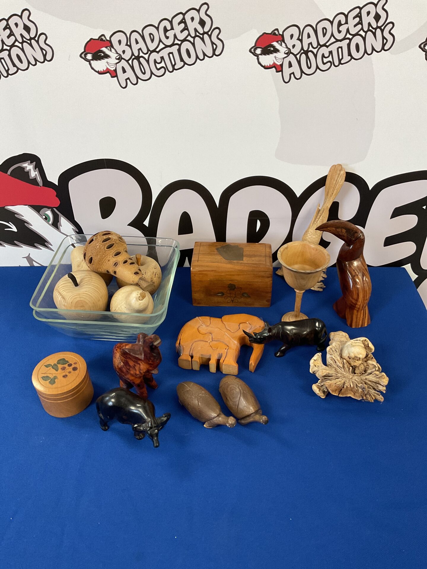 041 Box of wooden items including fruit & walnut elephant