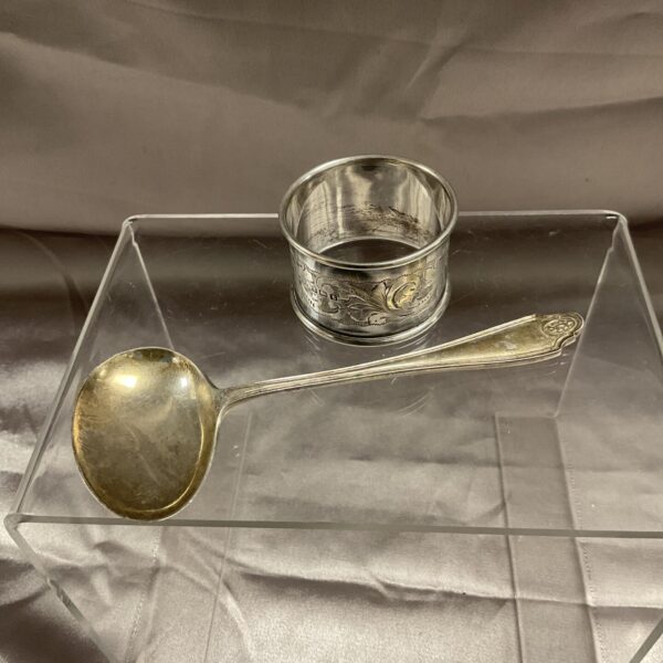 Vintage silver Jubilee spoon and napkin ring set.