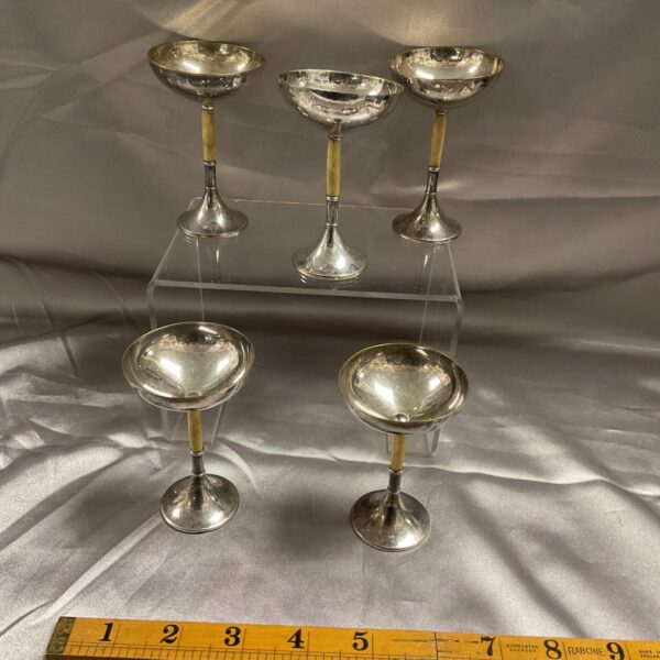 Set of five vintage silverplate goblets with wooden stems.