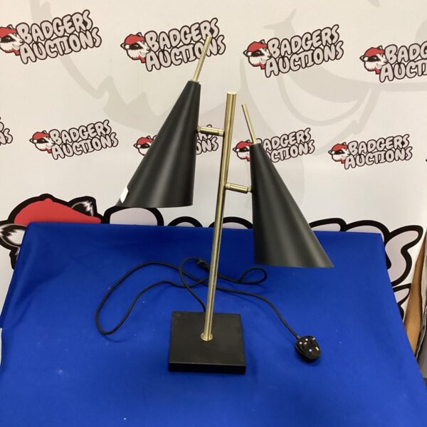 Black and brass adjustable reading lamp from John Lewis.