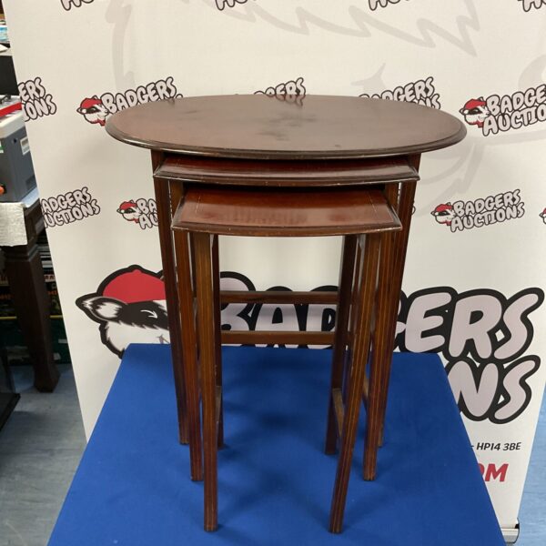 Vintage mahogany nest of tables with inlaid detailing.