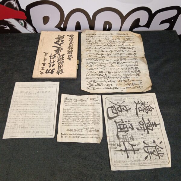 Vintage Japanese scripture with detailed calligraphy and aged pages.