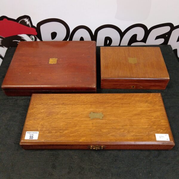 Vintage wooden cutlery box for silverware storage.