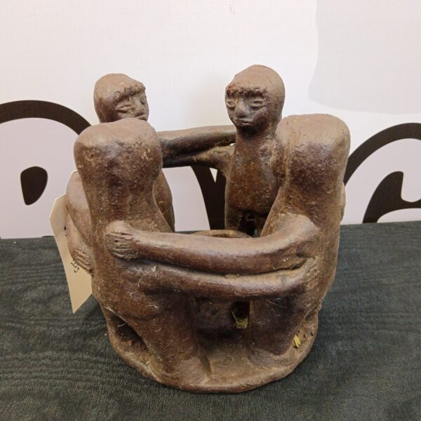 Vintage Mexican pottery sculpture of a circle of friends.