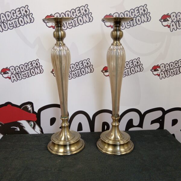 Pair of vintage clear glass candlesticks for home decor.