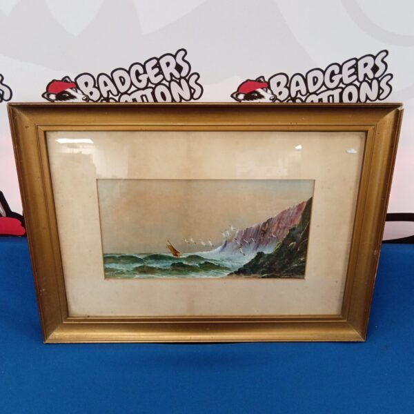 Vintage C. Colton seascape oil painting with sailboat and waves.