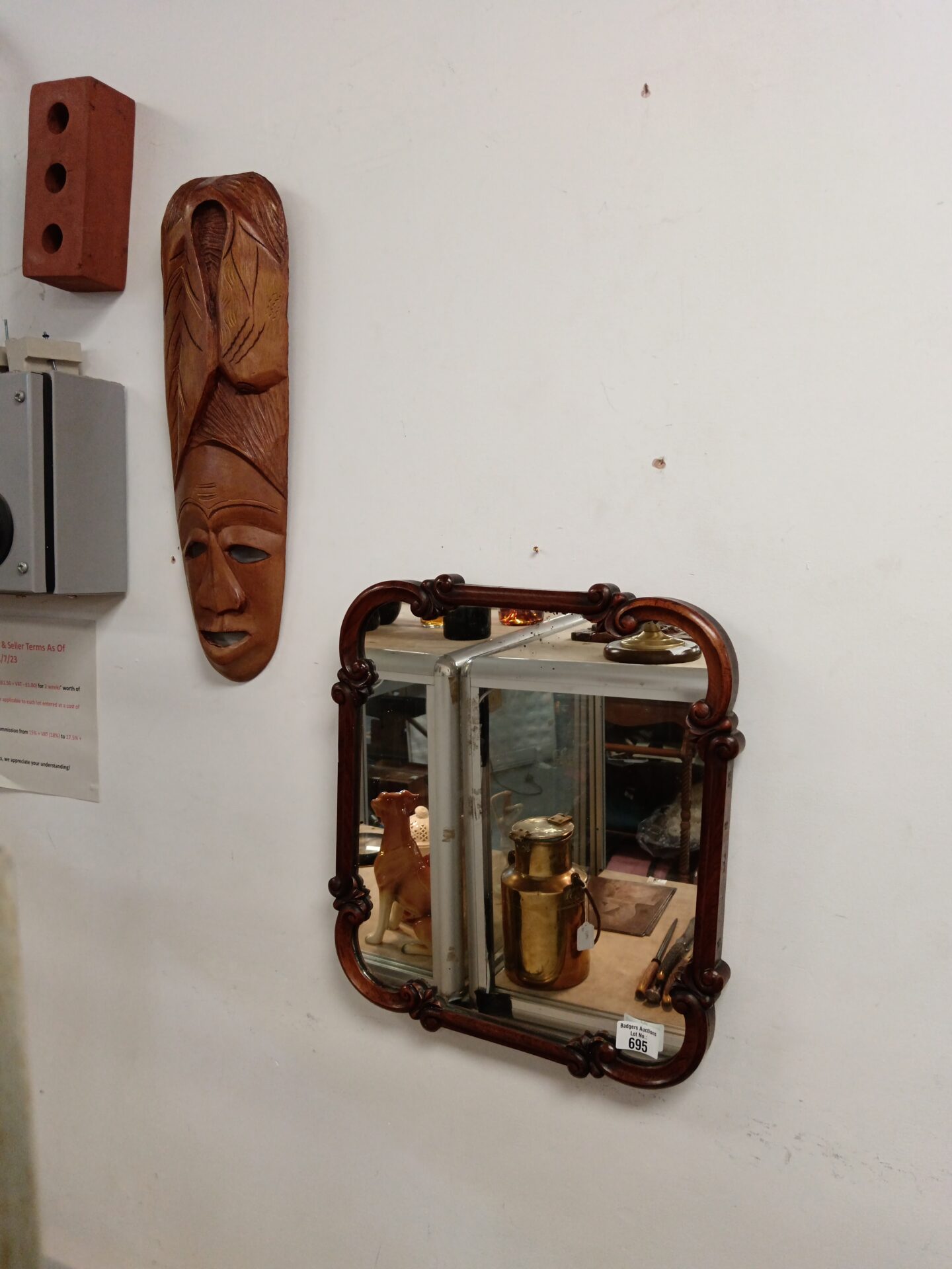 695 Art nouveau walnut framed mirror & African mask