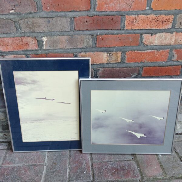 Framed photograph of a British Airways Concorde in flight.