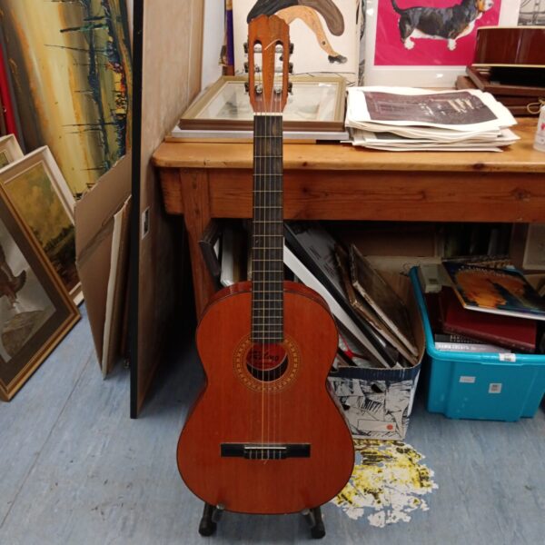 Vintage Ritmo Almeria Spanish acoustic guitar on display.