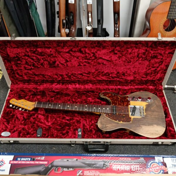 Custom Relecaster electric guitar in a G&G case.