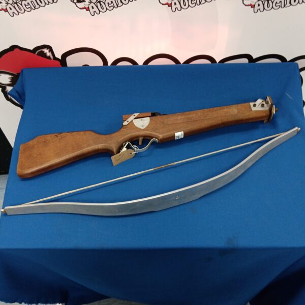 Vintage Barnett crossbow with wooden stock and metal prod.