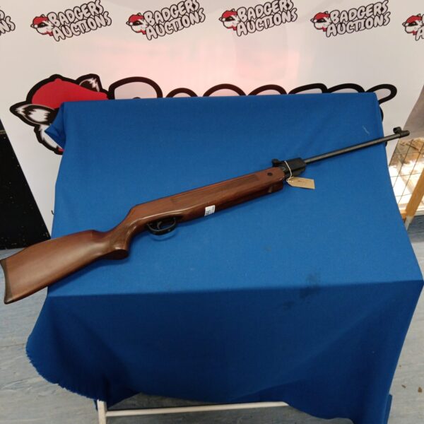 Vintage Edgar Bros Mod 60 .22 air rifle on display.