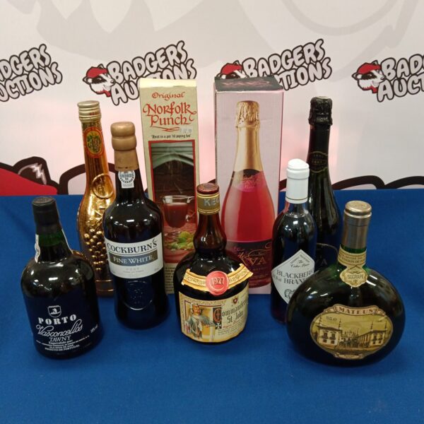 Mixed alcohol collection including Cockburns Port and Blackberry Brandy.