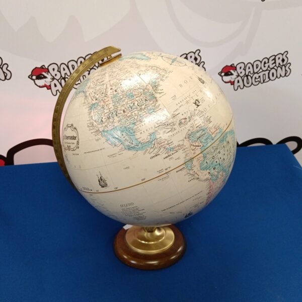 Vintage Replogle desktop globe with detailed world map.