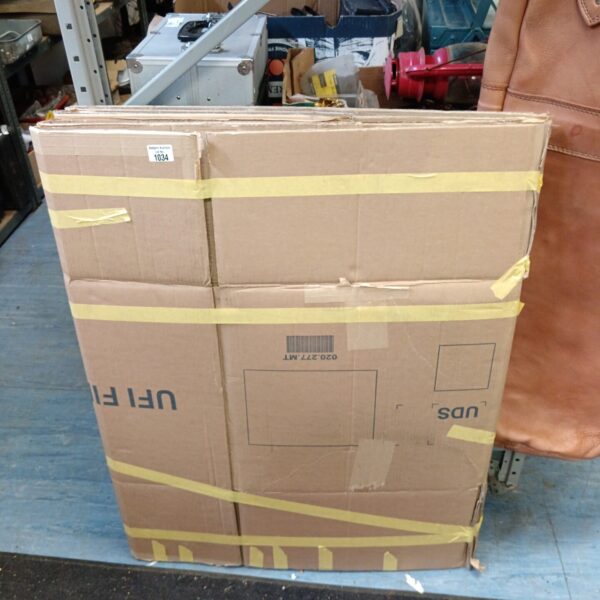 Bundle of large cardboard postal boxes for shipping and storage.