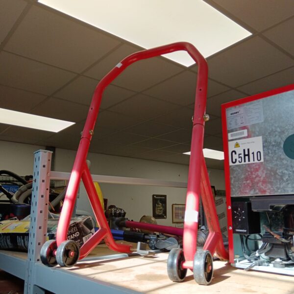Red bike lift stand, model C5H10, for motorcycle maintenance.