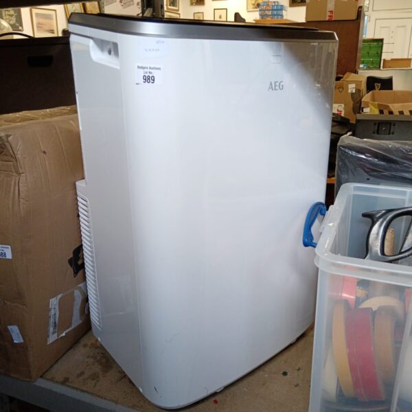 White AEG air conditioning unit, vintage cooling appliance.