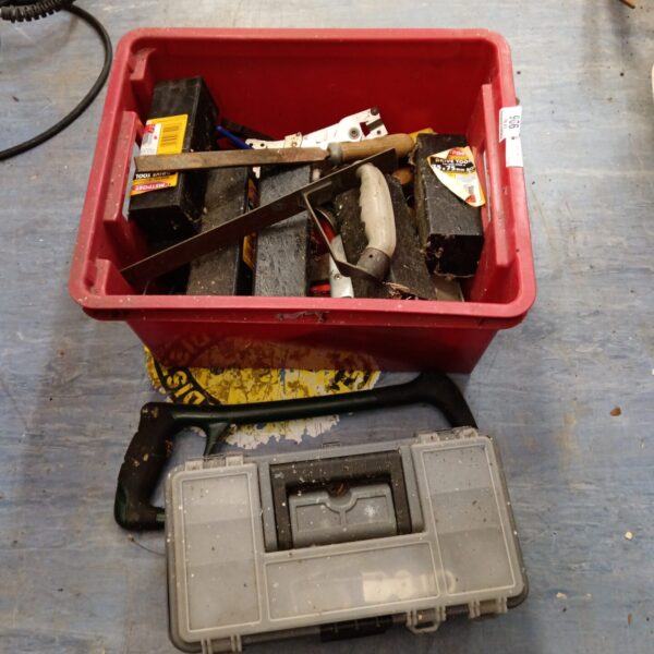 Metpost driver tools and hardware in a red storage box.