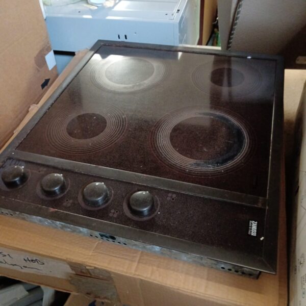 Black Zanussi halogen hob with four cooking zones.